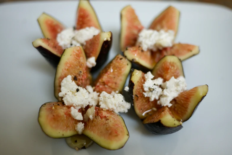 figs with goat cheese are cut in pieces