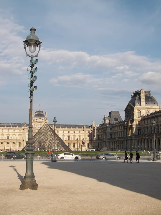 a street light with an empty street in front