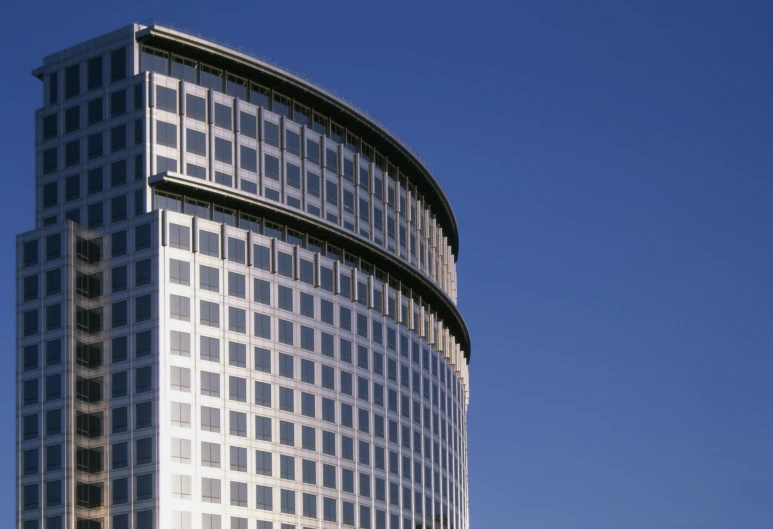 an up - close view of a high rise building from the ground