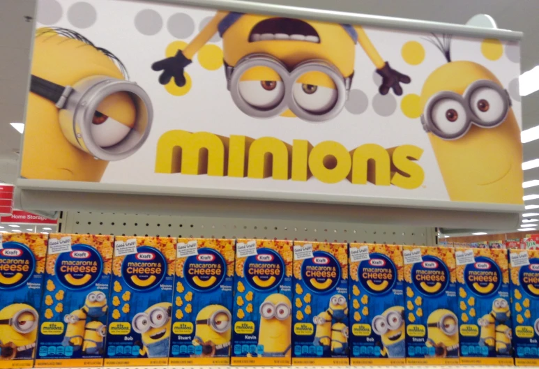 several boxes of despicable minion toys in a store aisle