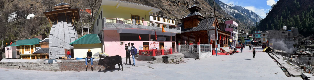 the large house is painted pink and orange