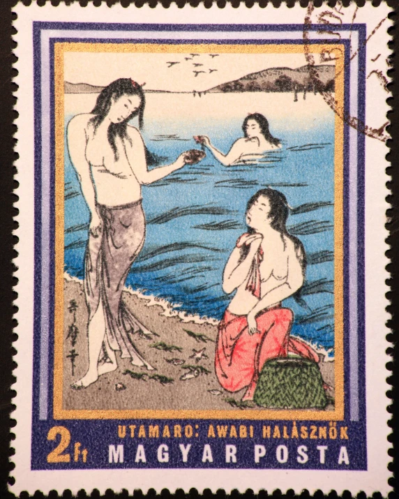a stamp with a painting of two women on a beach