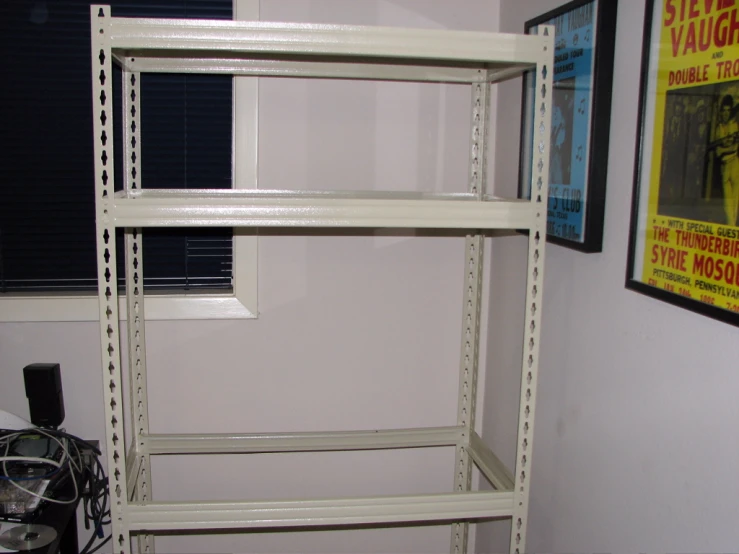 this is a metal shelving unit with various storage racks