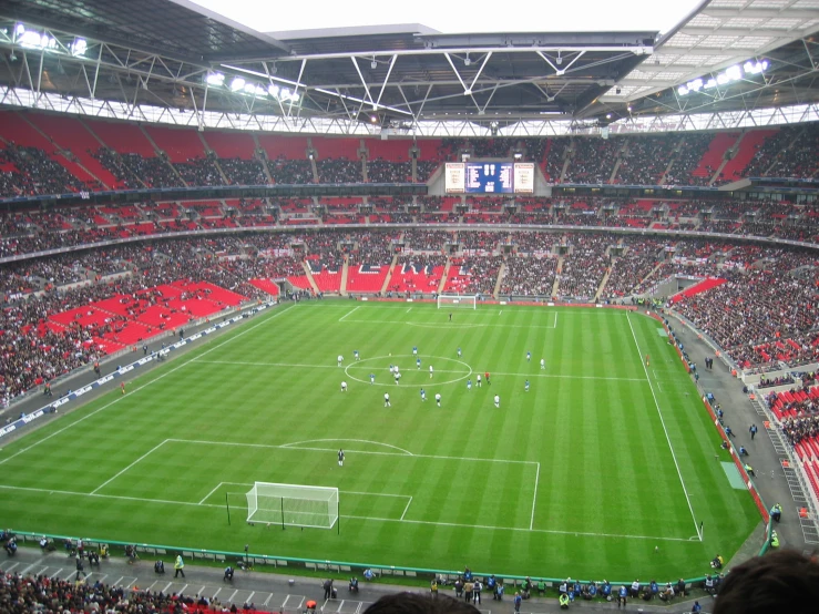 an empty soccer stadium with a lot of people