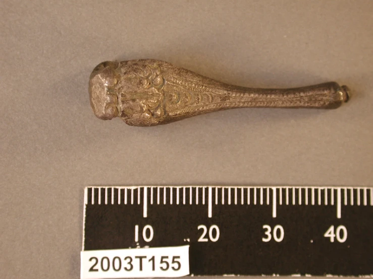 a very old and unusual looking handle from a medieval era