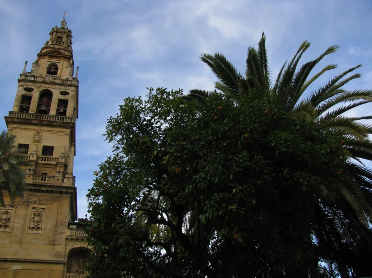 a large tall tower sitting under a blue sky