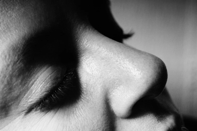 the nose of a woman with her eyes closed