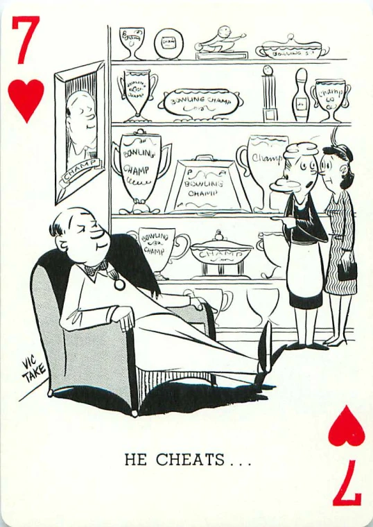 two people are playing cards on the table