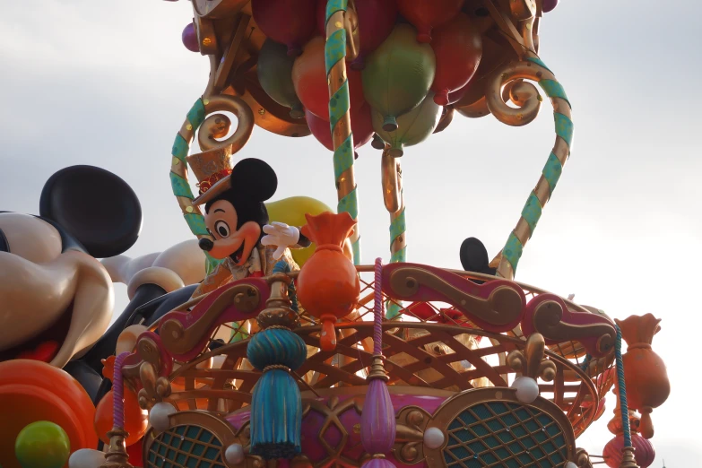 a mickey mouse themed float at an amut park