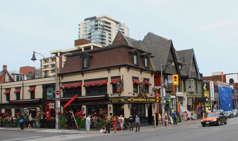 a busy city intersection on the corner of streets