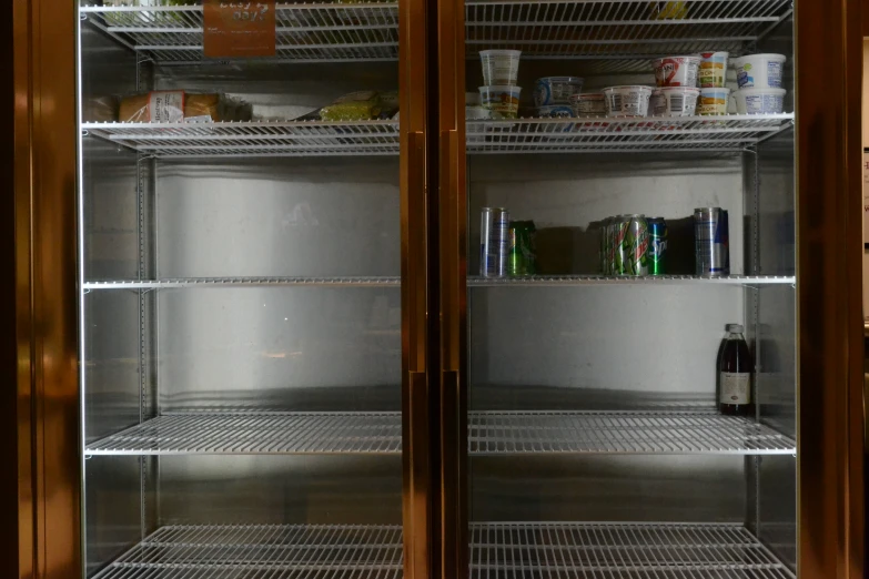 three shelves containing drinks and beverages are shown