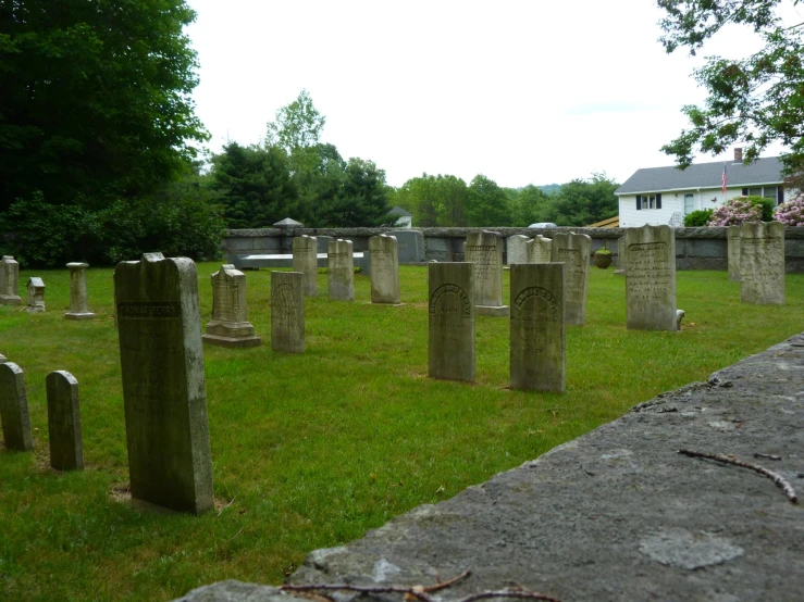 a cemetery with lots of headstones on it