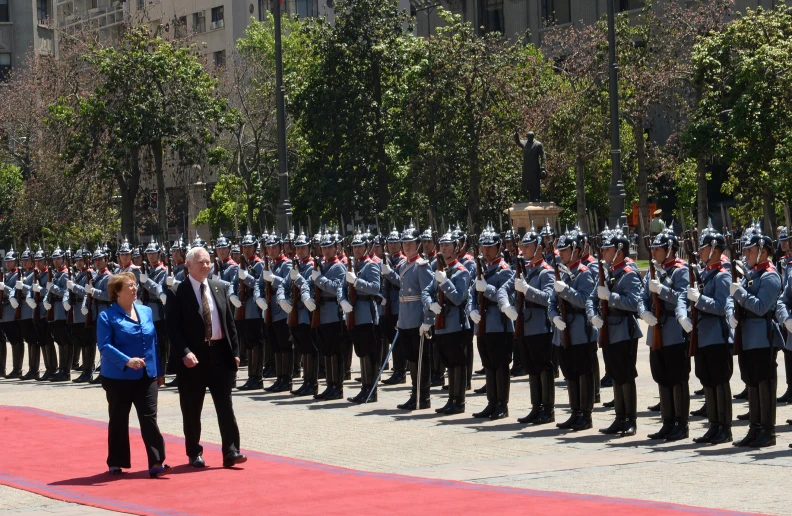 a person standing in front of a group of people