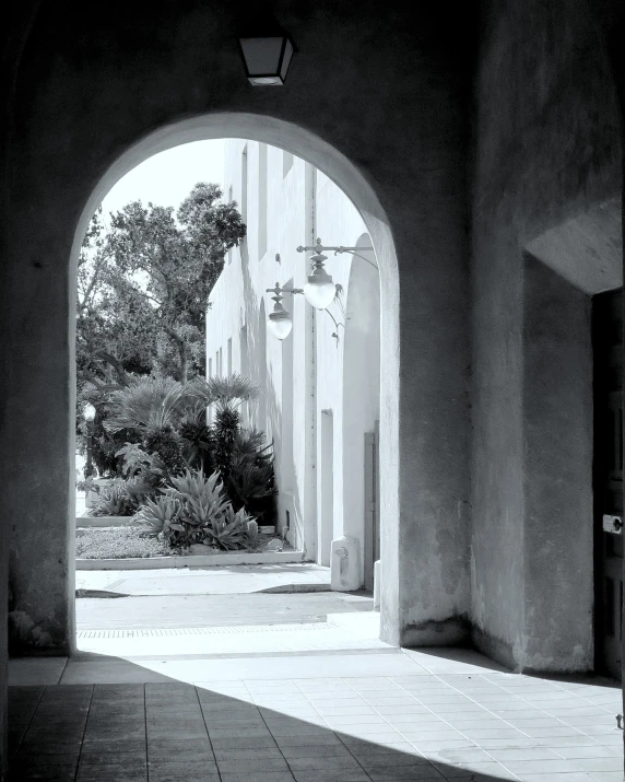 an archway leading to the other side of a building