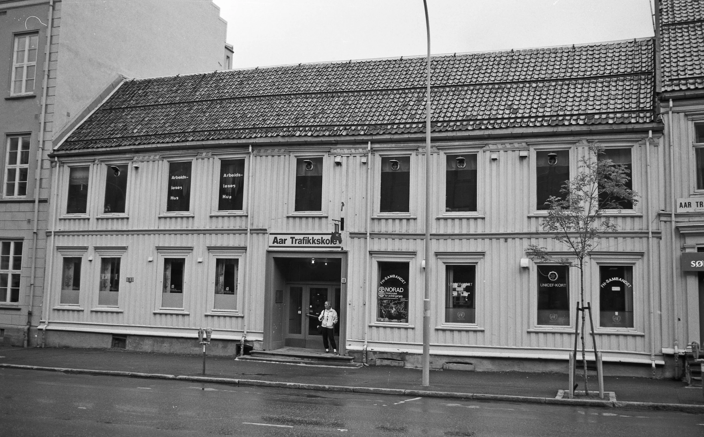 the old building has several windows that are boarded