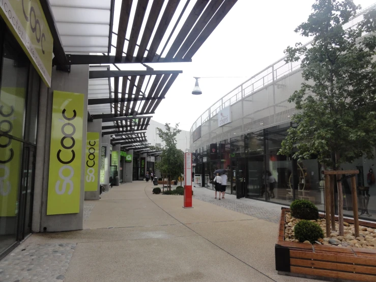 the street is empty and has an assortment of fruits