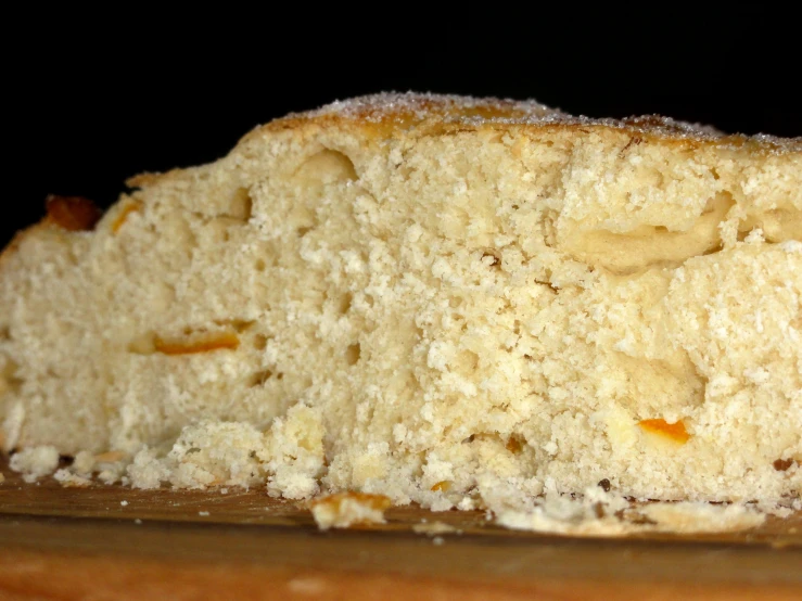 a slice of cake sits on the  board