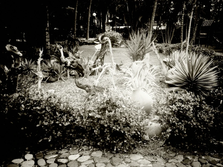 black and white pograph of two people sitting in the dark