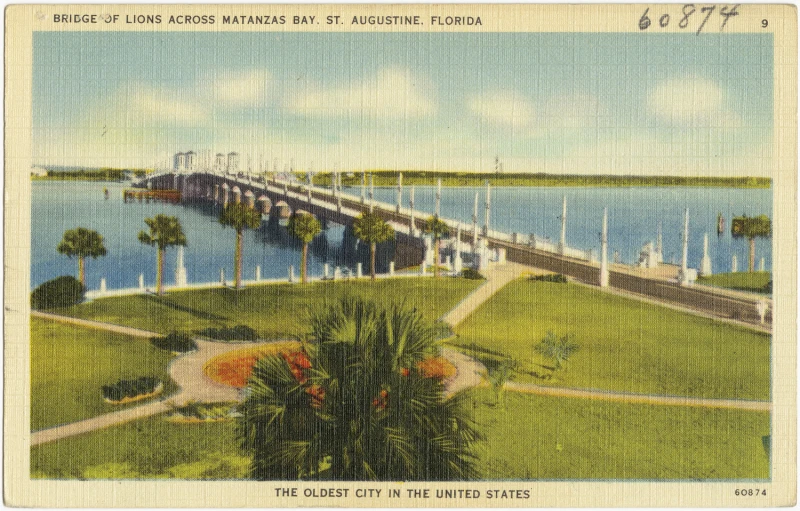 a vintage postcard showing a bridge going over the water