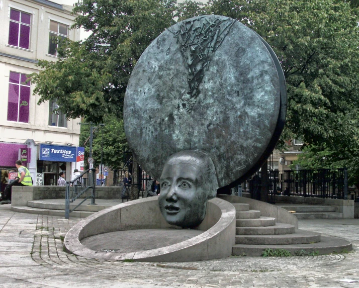 a bust of a person with a large piece of face in the center