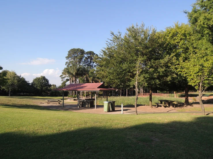 park with benches, pavilion and lots of trees