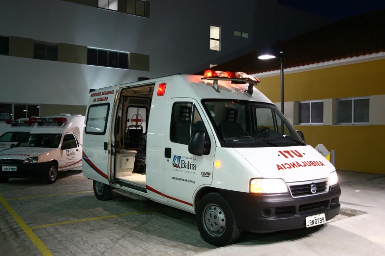 a van with an emergency light on its roof