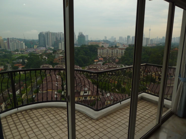 a balcony with several balconies overlooking a city