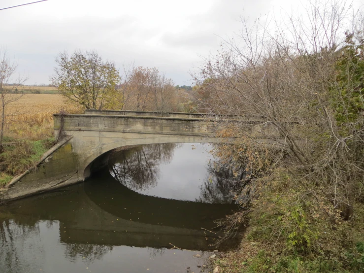 the bridge is open and has a small body of water