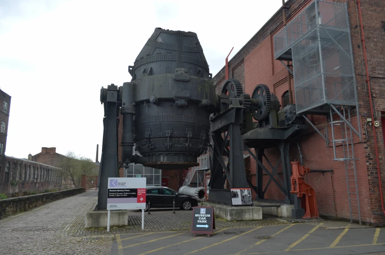 large industrial engine sitting in the center of a street