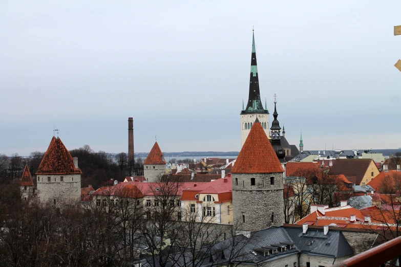 the tower and spires of the buildings stand tall