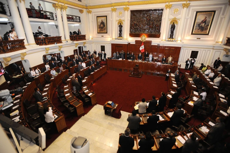 a large room with tables and a round floor in the middle