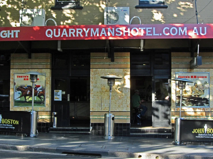 the front of a building with awnings