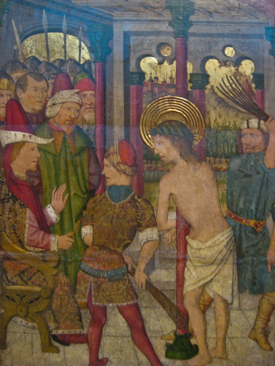 the painting shows an ancient man and several people