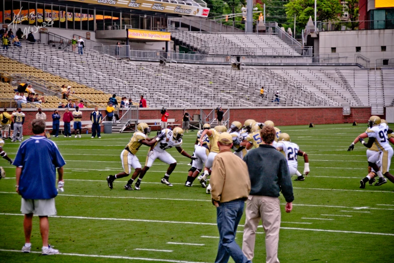 some football players are on the field for a game