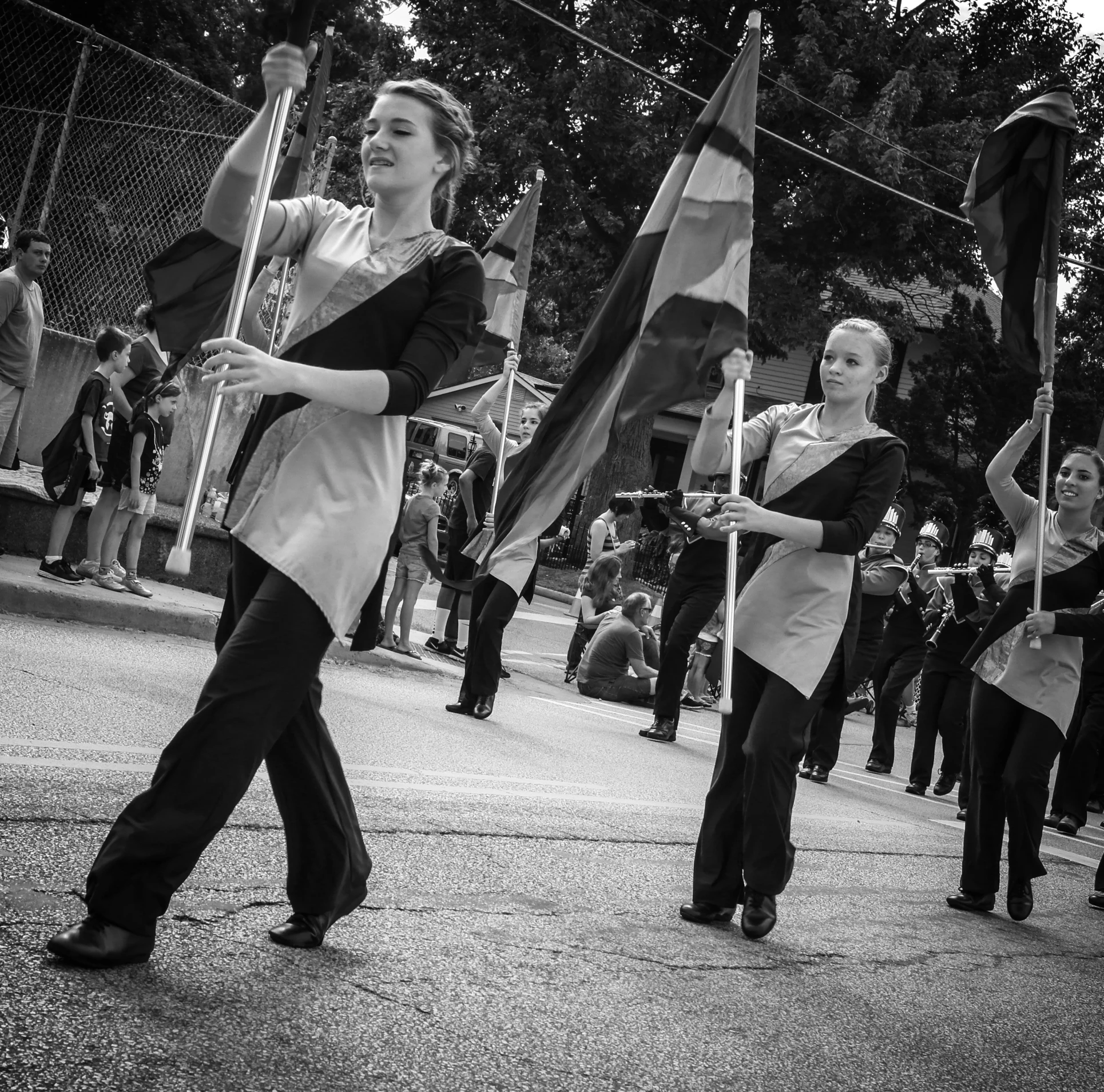 some girls are marching in an organized parade