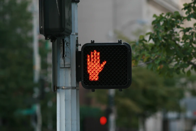 a traffic light sitting on the side of a street