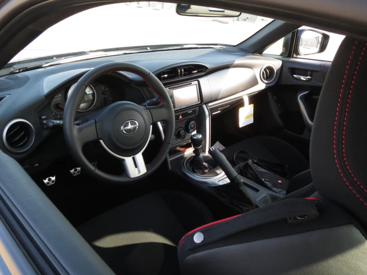 the interior of a car that is sitting on a floor