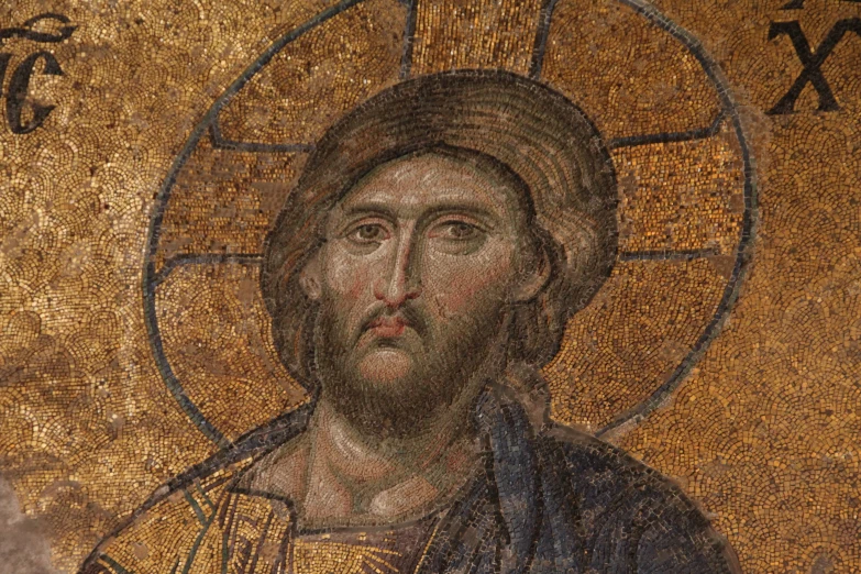 a mosaic depicts jesus with an open face