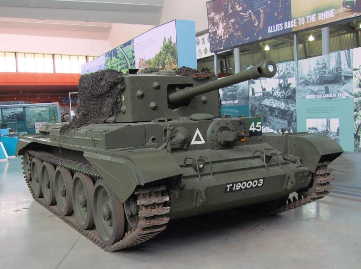 a large brown tank in a museum room