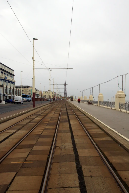 the tracks stretch down to the walkway along the beach