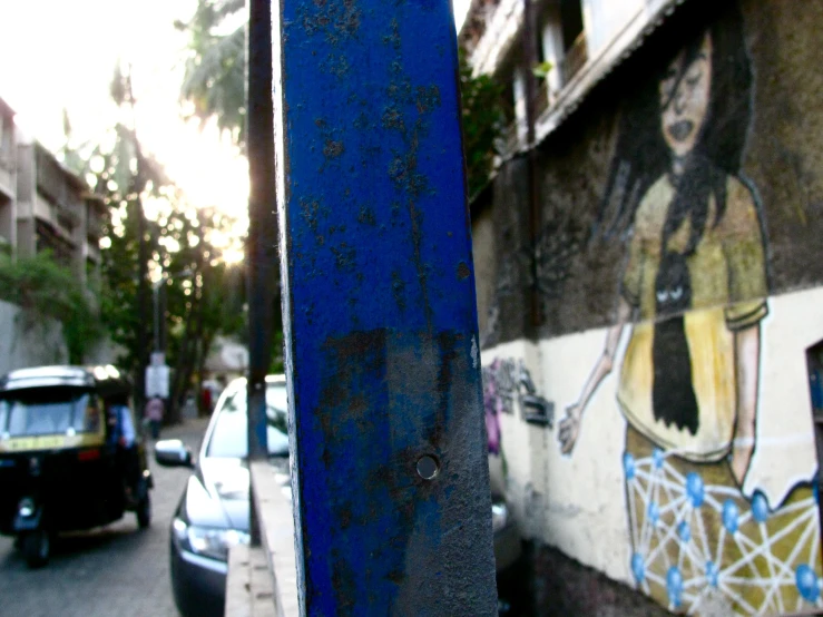 a blue object on the side of a building