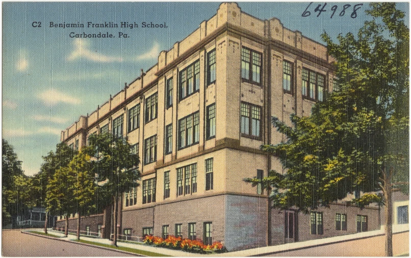 a vintage postcard showing the building at the corner of an intersection