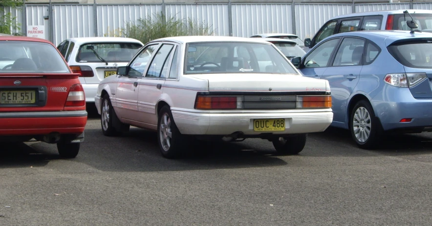 several cars parked in a parking lot