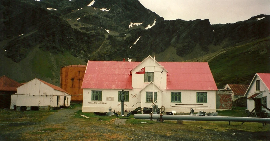 a group of houses in a mountain area