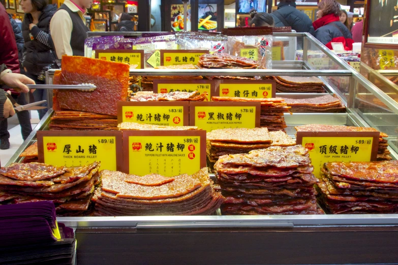 a display case filled with lots of food in it