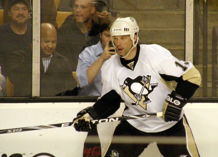 an image of a ice hockey player on the phone