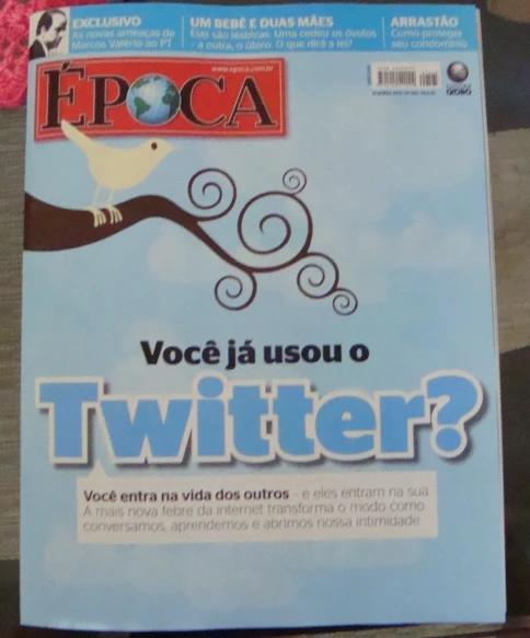 a cover of a magazine with a bird
