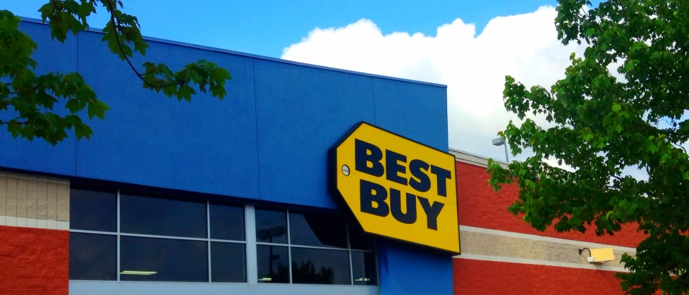 the exterior of a best buy store is seen
