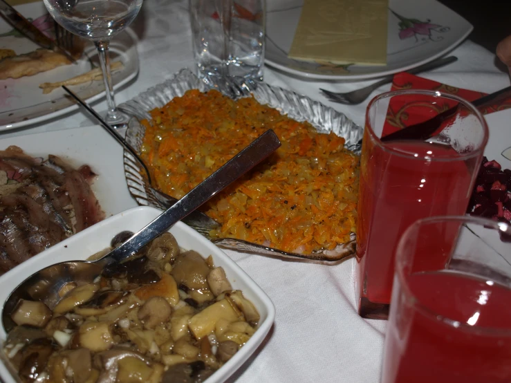 the serving dishes are covered with different vegetables and food items