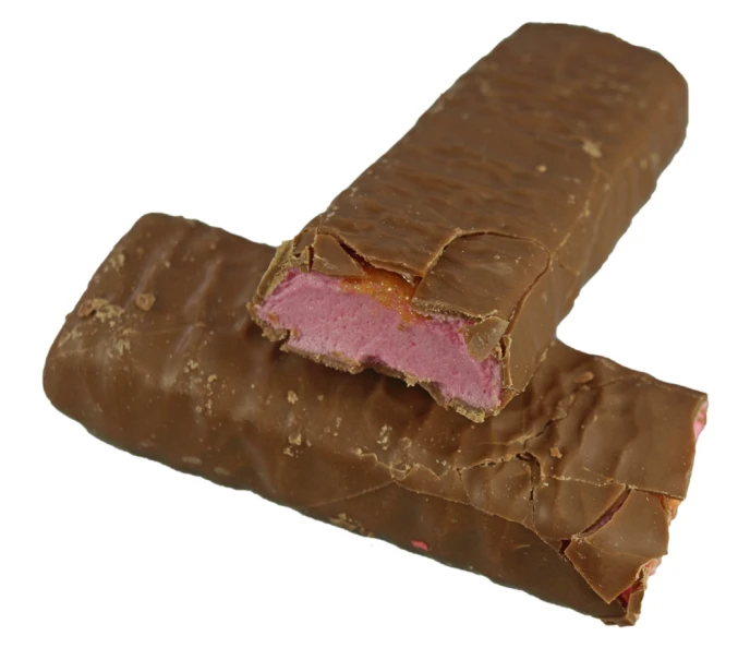 a large chocolate and pink bar that is cut in half